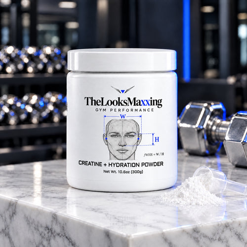 TheLooksMaxxing Creatine + Hydration Powder tub on a marble plinth in a dark gym